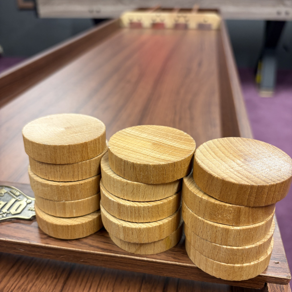 Sjoelbaki kettad laual